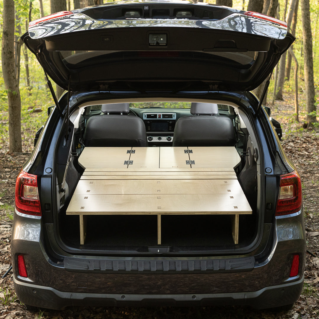 The CarToCamp Subaru Outback Sleeping Platform in its spacious trunk provides ample storage space.